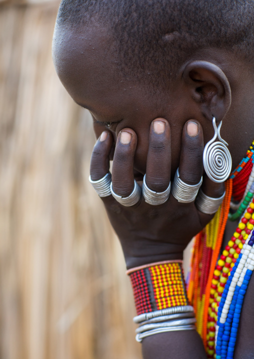 Erbore tribe woman with rings and earrings, Omo valley, Murale, Ethiopia