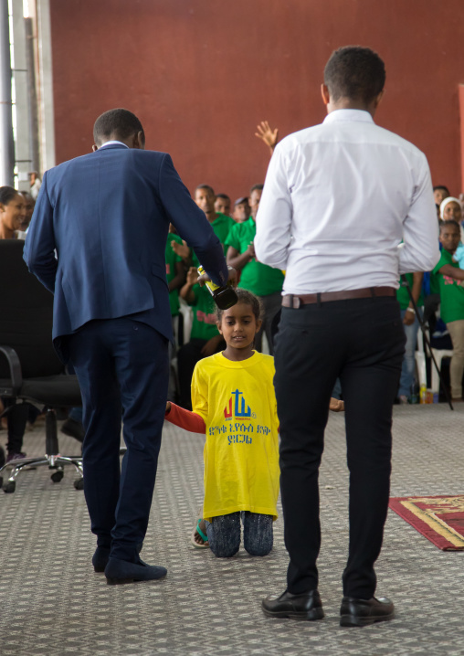 Prophet Israel blessing an ill girl during a celebration in his church, Addis Ababa region, Addis Ababa, Ethiopia