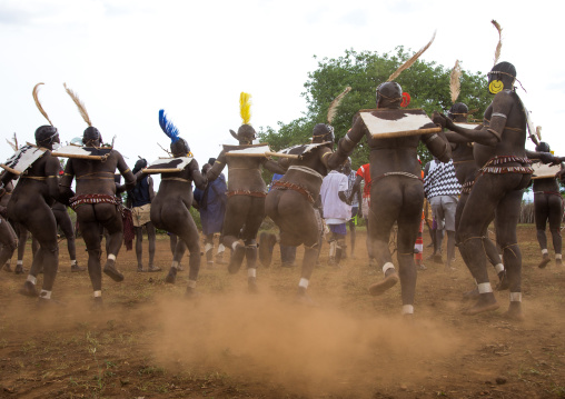 Bodi tribe fat men during Kael ceremony, Omo valley, Hana Mursi, Ethiopia