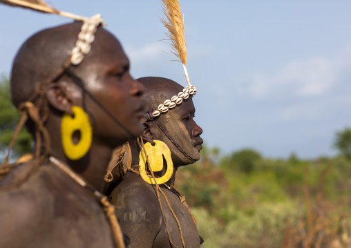 Bodi tribe fat men during Kael ceremony, Omo valley, Hana Mursi, Ethiopia