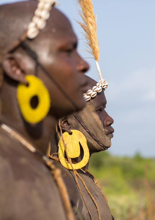 Bodi tribe fat men during Kael ceremony, Omo valley, Hana Mursi, Ethiopia