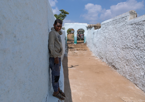 Child standing in the alley of a muslim holy site, Harari Region, Harar, Ethiopia