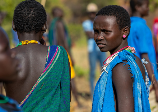 Suri tribe women watching a donga stick fighting ritual, Omo valley, Kibish, Ethiopia