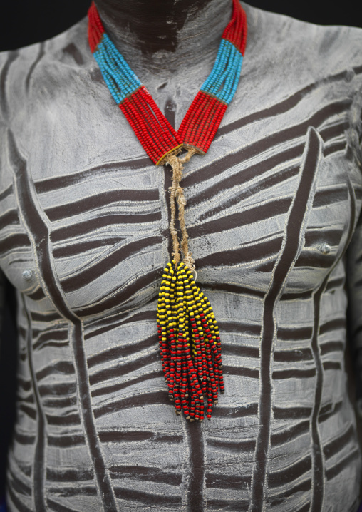 White Stripes Painted Karo Man With Beaded Necklace And Pendant Ethiopia