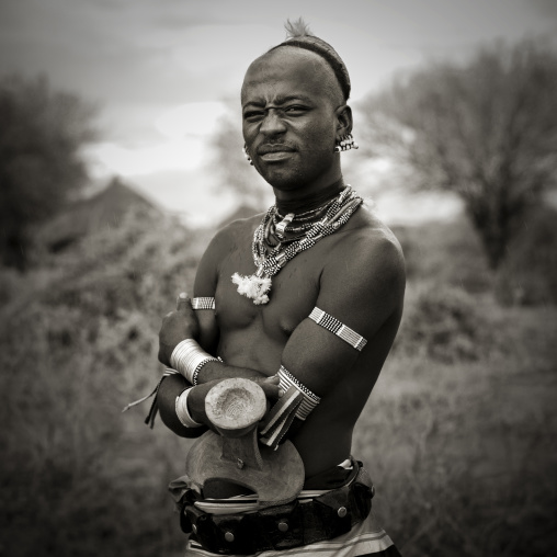 Portrait Of Bashada Man With Jewels And Headrest Omo Valley Ethiopia