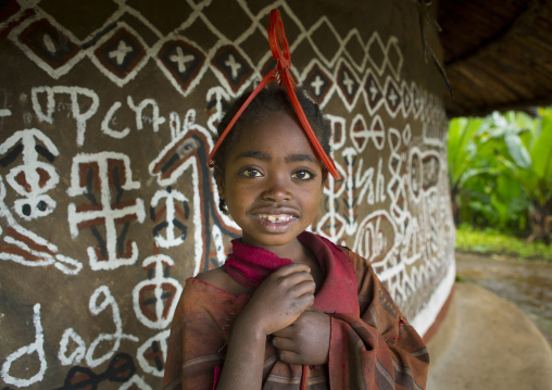Girly With A Toothy Smile In Front Of A Decorated House, Adama, Omo Valley, Ethiopia