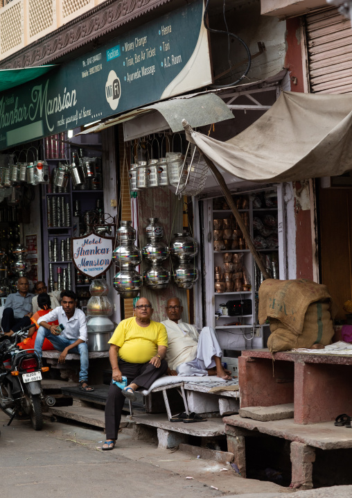 Indian people in front of shops in the street, Rajasthan, Bundi, India