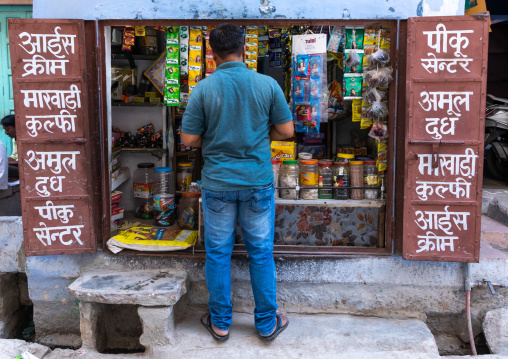 Traditional street life with indian sellers of shops, Rajasthan, Jodhpur, India