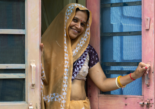 Portrait of a smiling rajasthani woman in traditional sari, Rajasthan, Bundi, India