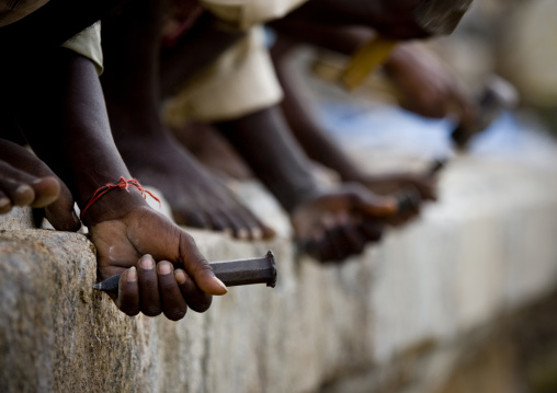 Hands Of Workers Cutting Stones With A Chisel At The Brihadishwara Temple, Gangaikondacholapuram, India