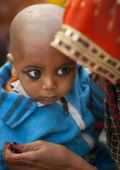 Kid Having His Hair Shaved, Maha Kumbh Mela, Allahabad, India