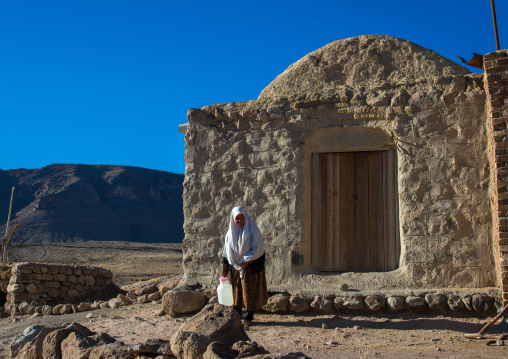 old widow woman in the troglodyte village, Kerman province, Meymand, Iran