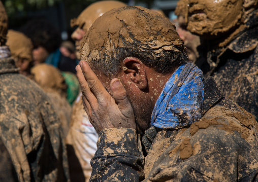 Iranian Shiite Muslim Man Covered In Mud Crying During Ashura Day, Kurdistan Province, Bijar, Iran