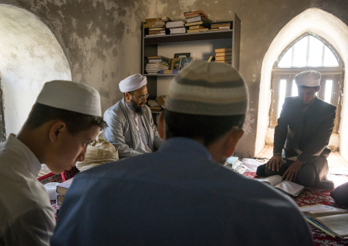 An Imam Teaching The Koran To Shiite Muslim Students In A Coranic School, Golestan Province, Karim Ishan, Iran