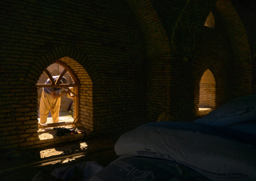 Iranian Worker Renovating An Old Caravanserai, Golestan Province, Karim Ishan, Iran