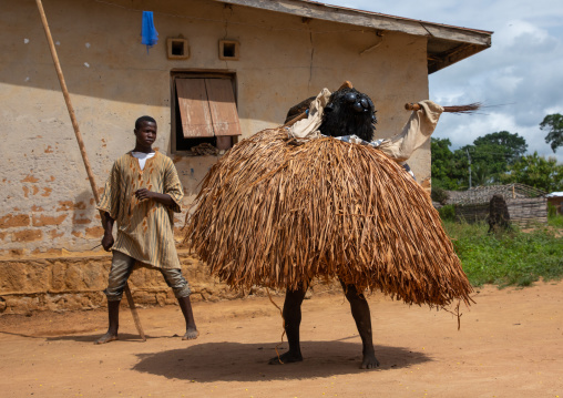 We Guere sacred mask dance during a ceremony, Guémon, Bangolo, Ivory Coast