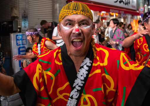 Japanese dancer with makeup during the Koenji Awaodori dance summer street festival, Kanto region, Tokyo, Japan