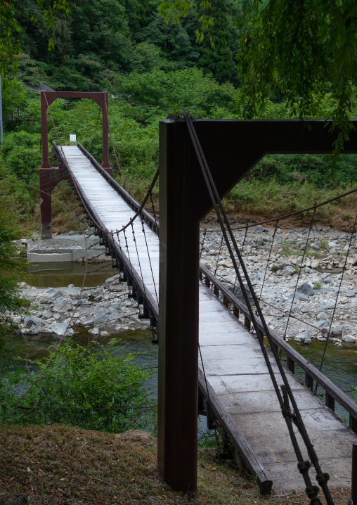 Wooden bridge in forest, Kyoto Prefecture, Miyama, Japan