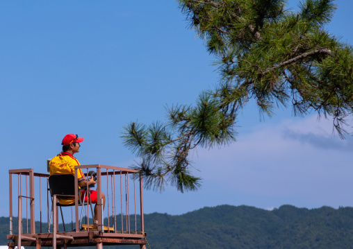 Japanese lifeguard on a high chair in Amanohashidate beach, Kyoto Prefecture, Miyazu, Japan