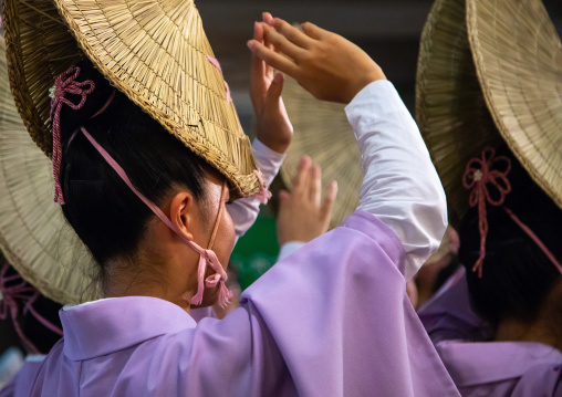 Japanese woman with straw hat during the Koenji Awaodori dance summer street festival, Kanto region, Tokyo, Japan