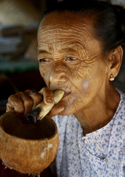 Elderly Woman Smoking Cigar, Bagan, Myanmar