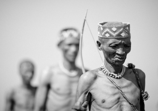 San Hunters Walking In The Bush, Namibia