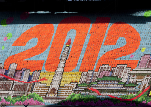 The Juche tower made by children pixels holding up colored boards during Arirang mass games in may day stadium, Pyongan Province, Pyongyang, North Korea