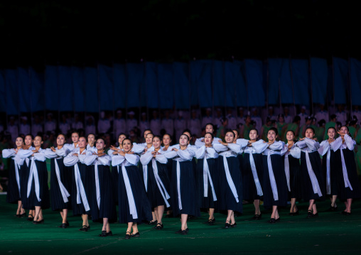 North Korean women dancing in choson-ot during the Arirang mass games in may day stadium, Pyongan Province, Pyongyang, North Korea