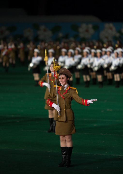 Sexy North Korean women dressed as soldiers dancing with swords during the Arirang mass games in may day stadium, Pyongan Province, Pyongyang, North Korea