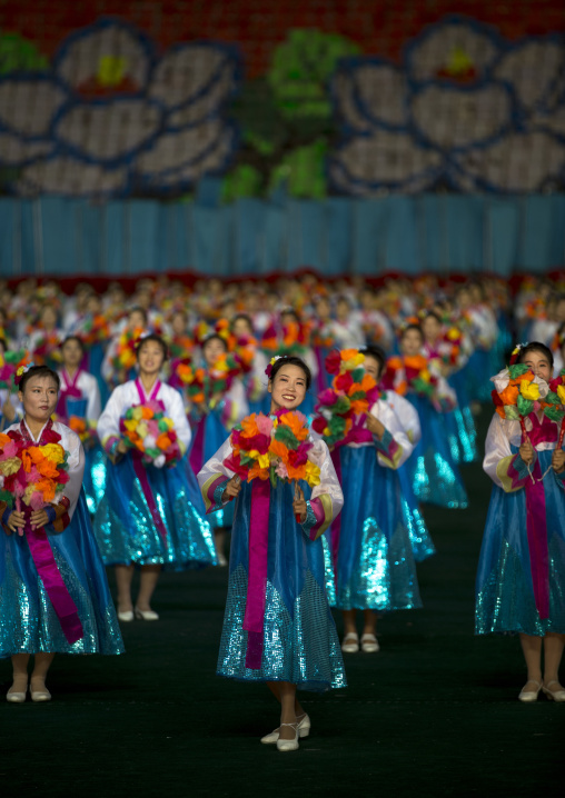 North Korean women dancing in choson-ot during the Arirang mass games in may day stadium, Pyongan Province, Pyongyang, North Korea