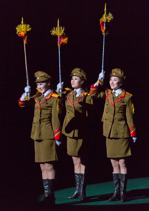 Sexy North Korean women dressed as soldiers dancing with swords during the Arirang mass games in may day stadium, Pyongan Province, Pyongyang, North Korea