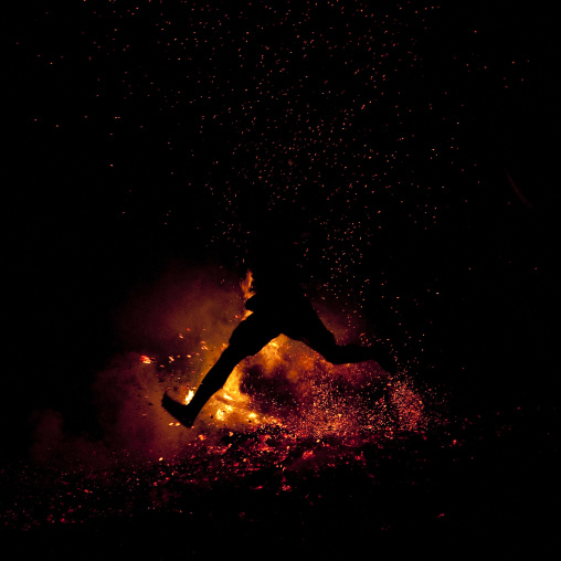 Dancer with a giant mask during a Baining tribe fire ceremony, East New Britain Province, Rabaul, Papua New Guinea