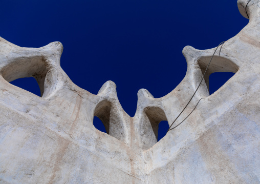 Traditional mud house crenels against blue sky, Najran Province, Najran, Saudi Arabia