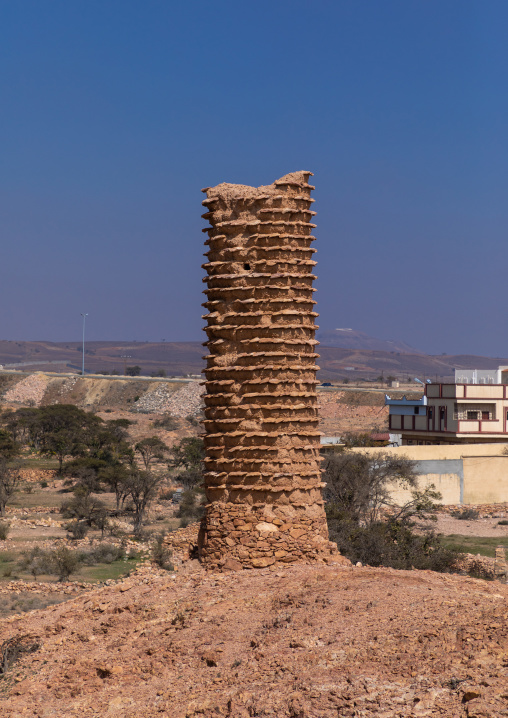 Aerial view of stone and mud watchtower with slates in a village, Asir province, Sarat Abidah, Saudi Arabia