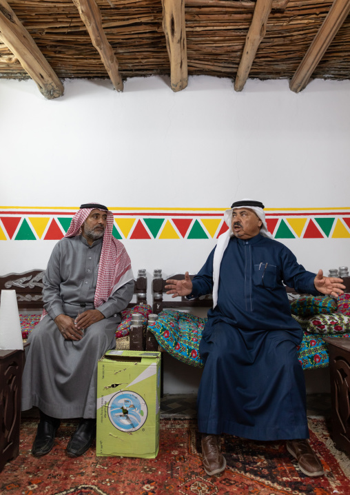 Saudi men inside a traditional house, Asir province, Tanomah, Saudi Arabia