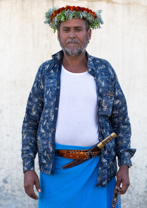 Portrait of a flower man wearing a floral crown on the head, Jizan Province, Addayer, Saudi Arabia