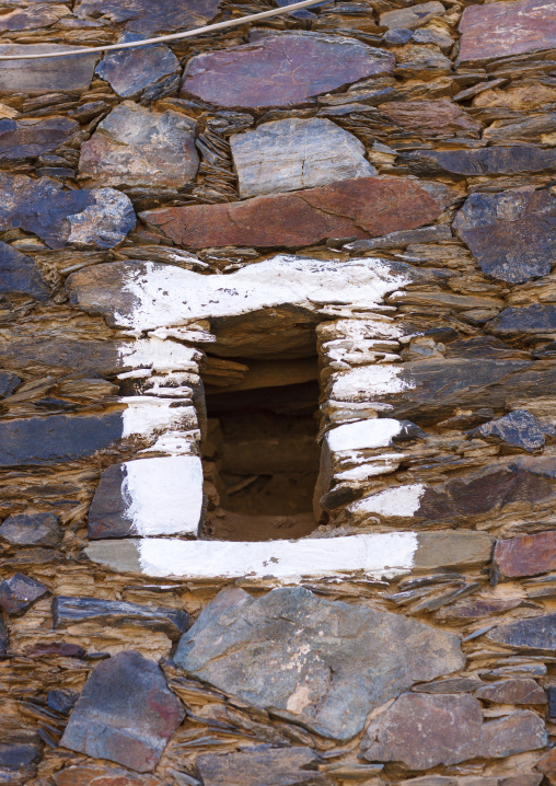 Window in rijal alma traditional village with typical aseeri architecture, Rijal Almaa Province, Rijal Alma, Saudi Arabia