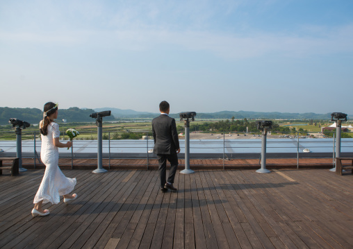 North korean defector joseph park with his south korean fiancee juyeon on the north and south korea border, Sudogwon, Paju, South korea