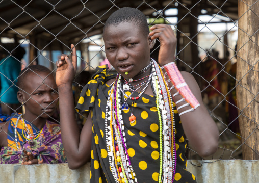 Toposa tribe women in traditional clothing in a market, Namorunyang State, Kapoeta, South Sudan