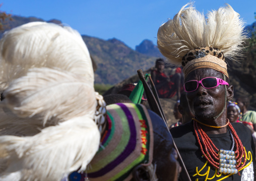 Larim tribe men dancing during a wedding ceremony, Boya Mountains, Imatong, South Sudan