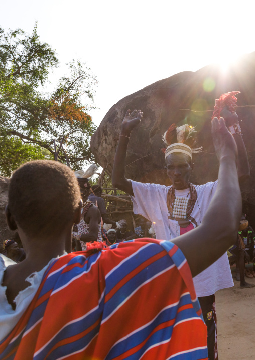 Larim tribe women and men dancing during a wedding celebration, Boya Mountains, Imatong, South Sudan