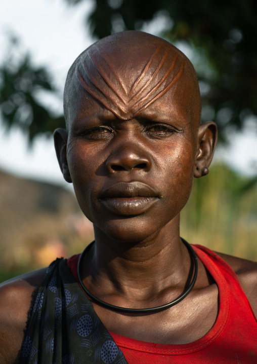 Portrait of a Mundari tribe woman with scarifications on the forehead, Central Equatoria, Terekeka, South Sudan