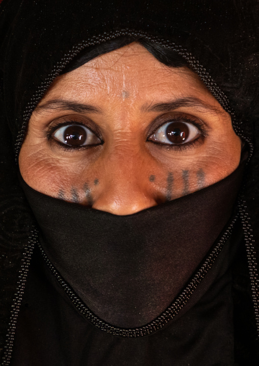 Portrait of a Rashaida tribe veiled woman inside her tent, Kassala State, Kassala, Sudan