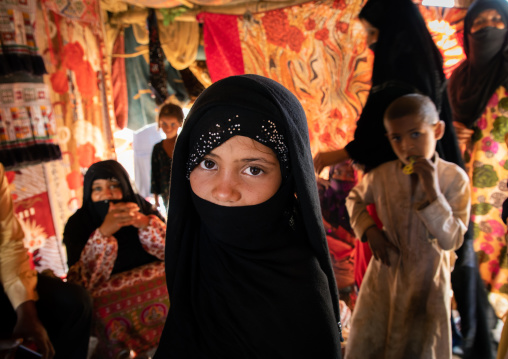 Portrait of Rashaida tribe veiled girl inside her tent, Kassala State, Kassala, Sudan